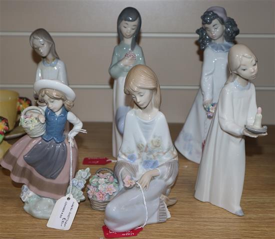 Six Lladro figures of girls with flowers and candles